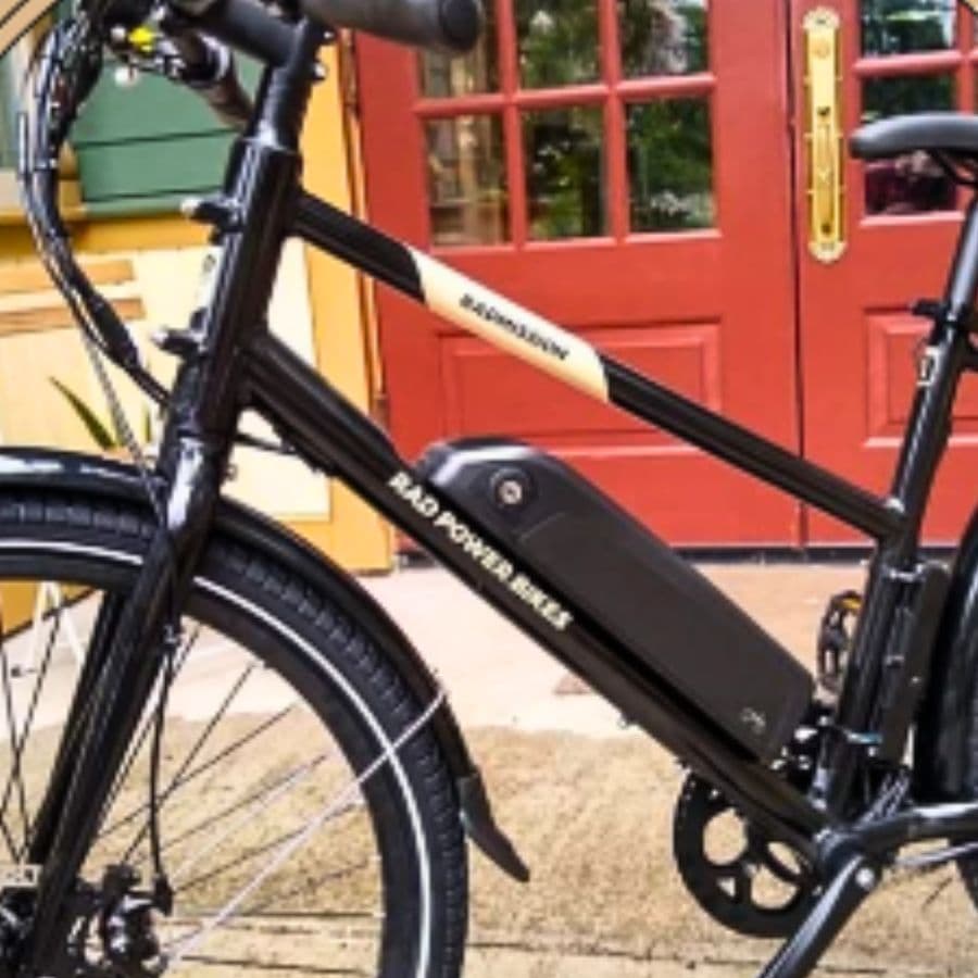 A black electric bike frame with a visible battery and the text "RAD POWER BIKES."