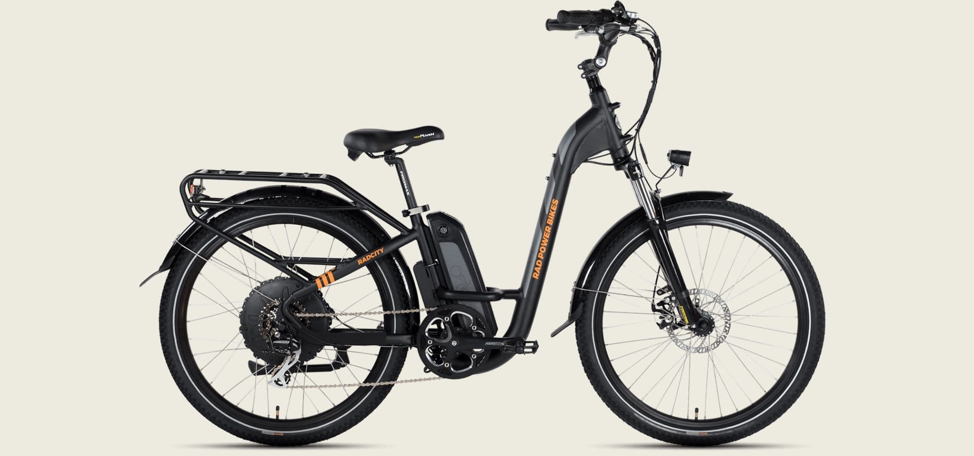 A black electric bike with a step-through frame and rear rack.