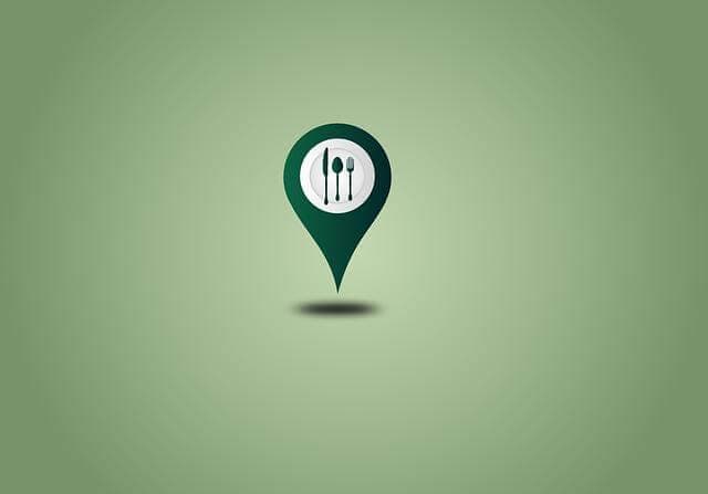 Green location pin icon with fork and knife symbol.
