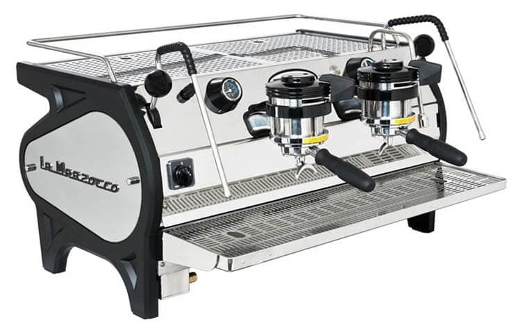 A shiny, silver espresso machine with two brewing heads and a steam wand.